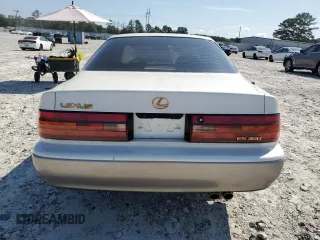 1994 Lexus ES 300 с VIN JT8GK13T5R0040669, выставлен на аукционе Copart как лот 66665464 с пробегом 53 513 миль миль и На запчасти • Non repairable. История ставок и продаж доступна на DreamBid. Изображение 6.