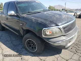 2000 Ford F-150 XL with VIN 1FTRX17W7YKB44552, listed as a Copart auction lot 72790504 with 0 mi miles and Salvage Title. Bid and sale history available at carsss.com. Image 10.