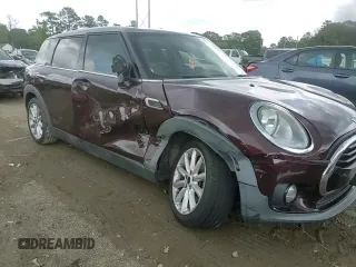 2016 MINI Clubman z VIN WMWLN5C56G2B28065, wystawiony jako Copart lot #54565825 z przebiegiem 129 270 mil mil oraz Szkoda całkowita • Salvage title. Historia ofert i sprzedaży dostępna na DreamBid. Obrazek 13.