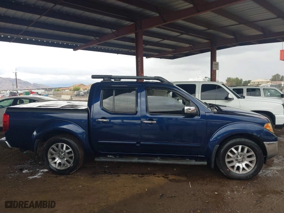 2011 Nissan Frontier PRO-4X with VIN 1N6AD0EV7BC426151, listed as a IAAI auction lot 41751873 with 152,464 mi miles. Bid and sale history available at carsss.com. Image 13.
