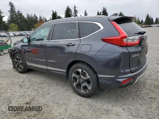 2018 Honda CR-V Touring with VIN 7FARW2H90JE055060, listed as a Copart auction lot 54882545 with 56,395 mi miles and Salvage Title. Bid and sale history available at carsss.com. Image 2.