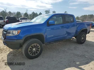 2019 Chevrolet Colorado 4WD ZR2 z VIN 1GCGTEEN7K1135593, wystawiony jako Copart lot #46472755 z przebiegiem 154 639 mil mil oraz Szkoda całkowita • Salvage title. Historia ofert i sprzedaży dostępna na DreamBid. Obrazek 1.