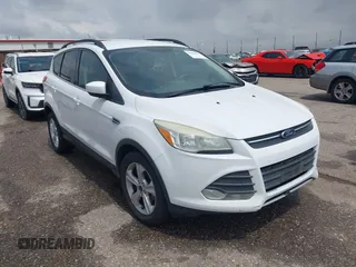2014 Ford Escape SE with VIN 1FMCU9GX6EUD51032, listed as a IAAI auction lot 42206659 with 131,438 mi miles and . Bid and sale history available at DreamBid. Image 1.