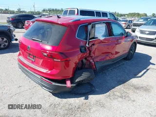 2024 Volkswagen Tiguan SE with VIN 3VVNB7AX5RM061571, listed as a IAAI auction lot 41837016 with 4,969 mi miles and . Bid and sale history available at DreamBid. Image 4.