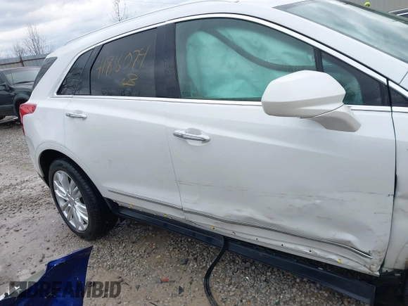 2019 Cadillac XT5 Premium Luxury FWD z VIN 1GYKNERS1KZ290754, wystawiony jako IAAI lot #41816074 z przebiegiem 91 585 mil mil oraz . Historia ofert i sprzedaży dostępna na DreamBid. Obrazek 13.