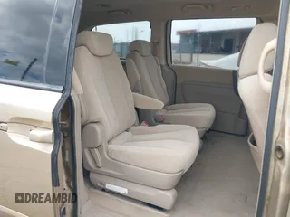 2006 Kia Sedona LX with VIN KNDMB233366045016, listed as a IAAI auction lot 42112039 with 122,246 mi miles and . Bid and sale history available at DreamBid. Image 8.