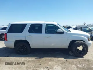 2009 Chevrolet Tahoe 1LT z VIN 1GNFK23049R106012, wystawiony jako IAAI lot #41695274 z przebiegiem 212 989 mil mil oraz . Historia ofert i sprzedaży dostępna na DreamBid. Obrazek 13.