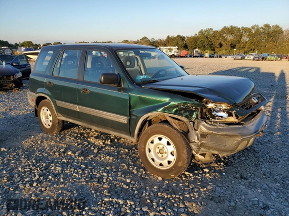 2000 Honda CR-V LX with VIN JHLRD1848YC038520, listed as a Copart auction lot 74137634 with 104,332 mi miles and Salvage Title. Bid and sale history available at carsss.com. Image 4.