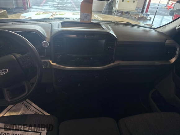 2021 Ford F-150 XL with VIN 1FTFX1E51MKF07502, listed as a IAAI auction lot 42737762 with 90,272 mi miles and . Bid and sale history available at DreamBid. Image 2.