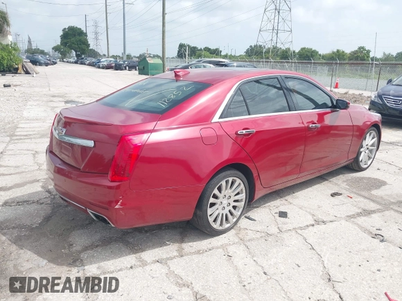 2015 Cadillac CTS Luxury AWD with VIN 1G6AX5SX2F0112852, listed as a IAAI auction lot 42398611 with 70,253 mi miles and . Bid and sale history available at DreamBid. Image 4.