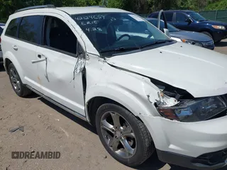 2016 Dodge Journey Crossroad Plus z VIN 3C4PDCGG4GT154134, wystawiony jako IAAI lot #42124659 z przebiegiem 101 700 mil mil oraz . Historia ofert i sprzedaży dostępna na DreamBid. Obrazek 6.