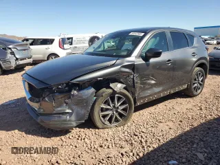 2018 Mazda CX-5 Touring z VIN JM3KFACM0J1456207, wystawiony jako Copart lot #50442585 z przebiegiem 47 448 mil mil oraz Szkoda całkowita • Salvage title. Historia ofert i sprzedaży dostępna na DreamBid. Obrazek 1.