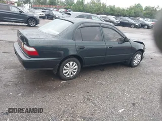 1997 Toyota Corolla with VIN 2T1BA02E2VC211034, listed as a IAAI auction lot 42253359 with 201,451 mi miles and . Bid and sale history available at DreamBid. Image 4.