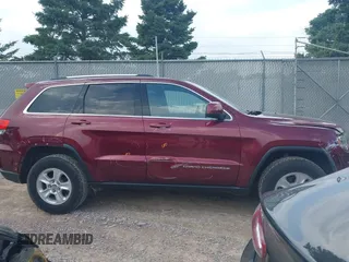 2016 Jeep Grand Cherokee Laredo with VIN 1C4RJFAG8GC318878, listed as a IAAI auction lot 42600747 with 85,882 mi miles and . Bid and sale history available at DreamBid. Image 13.