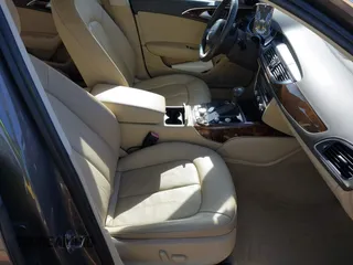 2014 Audi A6 Premium Plus z VIN WAUDFAFC7EN087684, wystawiony jako IAAI lot #41409408 z przebiegiem 69 916 mil mil oraz . Historia ofert i sprzedaży dostępna na DreamBid. Obrazek 5.