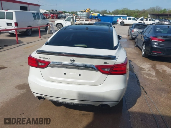 2016 Nissan Maxima SL with VIN 1N4AA6AP5GC383075, listed as a IAAI auction lot 41415505 with 164,392 mi miles and . Bid and sale history available at DreamBid. Image 16.