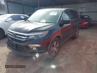 2017 Honda Pilot EX-L with VIN 5FNYF5H5XHB005735, listed as a IAAI auction lot 41791678 with 131,480 mi miles. Bid and sale history available at carsss.com. Image 18.