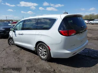2023 Chrysler Voyager LX with VIN 2C4RC1CG4PR534115, listed as a IAAI auction lot 41979160 with 54,199 mi miles. Bid and sale history available at carsss.com. Image 3.