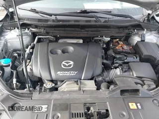 2014 Mazda CX-5 Touring with VIN JM3KE2CY9E0310315, listed as a IAAI auction lot 41943991 with 98,359 mi miles and . Bid and sale history available at carsss.com. Image 10.
