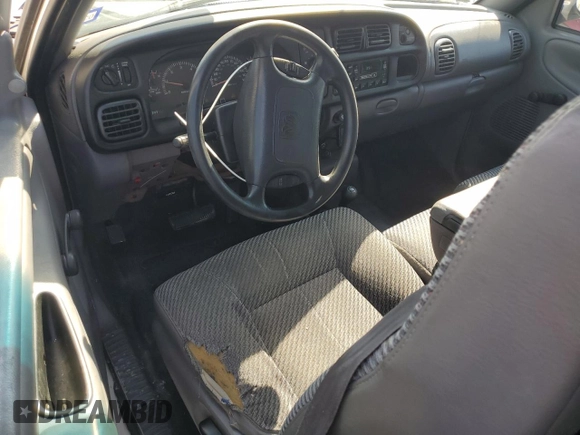 2000 Dodge 1500 z VIN 3B7HF12Y0YG147372, wystawiony jako Copart lot #74925094 z przebiegiem 247 162 mil mil oraz Szkoda całkowita • Salvage title. Historia ofert i sprzedaży dostępna na DreamBid. Obrazek 8.
