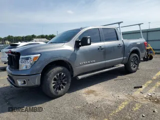 2018 Nissan Titan SV with VIN 1N6AA1E50JN514802, listed as a Copart auction lot 62342875 with 101,593 mi miles and Salvage title. Bid and sale history available at DreamBid. Image 1.