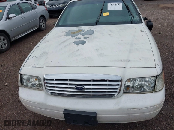 2001 Ford Crown Victoria Police Interceptor z VIN 2FAFP71W21X165218, wystawiony jako IAAI lot #42062199 z przebiegiem 233 978 mil mil oraz . Historia ofert i sprzedaży dostępna na DreamBid. Obrazek 6.