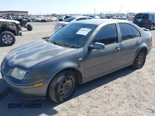 2003 Volkswagen Jetta GL z VIN 3VWRK69M43M117878, wystawiony jako IAAI lot #42553211 z przebiegiem 183 524 mil mil oraz . Historia ofert i sprzedaży dostępna na DreamBid. Obrazek 2.