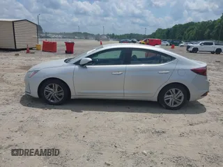 2019 Hyundai Elantra SEL z VIN KMHD84LF6KU746655, wystawiony jako IAAI lot #42135528 z przebiegiem 103 410 mil mil oraz . Historia ofert i sprzedaży dostępna na DreamBid. Obrazek 14.