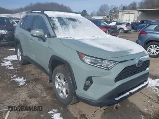2021 Toyota RAV4 Hybrid XLE with VIN 4T3RWRFV2MU024587, listed as a IAAI auction lot 41496119 with 52,809 mi miles. Bid and sale history available at carsss.com. Image 1.