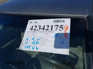 2000 Toyota Camry CE z VIN JT2BG22K4Y0394606, wystawiony jako IAAI lot #42342175 z przebiegiem 245 616 mil mil oraz . Historia ofert i sprzedaży dostępna na DreamBid. Obrazek 12.