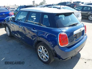2015 MINI Hardtop 4 Door with VIN WMWXS5C50FT832438, listed as a IAAI auction lot 42632469 with 96,432 mi miles and . Bid and sale history available at DreamBid. Image 3.