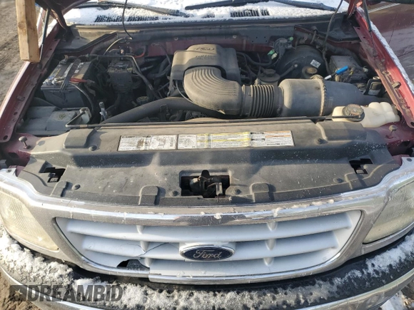 1999 Ford F-150 with VIN 1FTRF17W7XNA44872, listed as a Copart auction lot 41815695 with 182,678 mi miles and Salvage title. Bid and sale history available at DreamBid. Image 12.