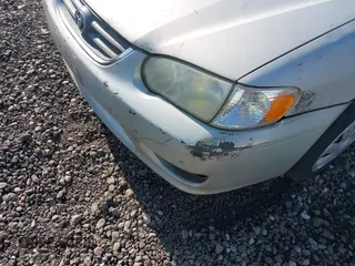2001 Toyota Corolla CE with VIN 2T1BR12E61C473602, listed as a IAAI auction lot 42408733 with Not provided miles and . Bid and sale history available at DreamBid. Image 6.