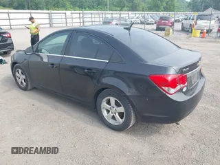 2014 Chevrolet Cruze 1LT with VIN 1G1PC5SB0E7291575, listed as a IAAI auction lot 42417379 with 111,705 mi miles and . Bid and sale history available at DreamBid. Image 3.