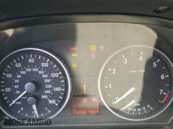 2007 BMW 3 Series 328i with VIN WBAVA37557NL12699, listed as a Copart auction lot 46258735 with 173,338 mi miles and Salvage title. Bid and sale history available at DreamBid. Image 9.