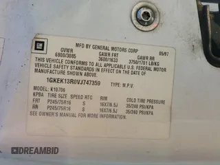 1997 GMC Yukon with VIN 1GKEK13R0VJ747359, listed as a Copart auction lot 48301095 with 272,417 mi miles and Salvage Title. Bid and sale history available at carsss.com. Image 13.