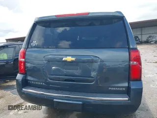 2019 Chevrolet Suburban Premier z VIN 1GNSCJKC0KR139323, wystawiony jako IAAI lot #42100758 z przebiegiem Nie podano mil oraz . Historia ofert i sprzedaży dostępna na DreamBid. Obrazek 16.