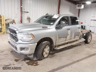 2023 Ram 2500 Big Horn with VIN 3C6UR5JJXPG586831, listed as a IAAI auction lot 41573622 with 66,510 mi miles. Bid and sale history available at carsss.com. Image 2.