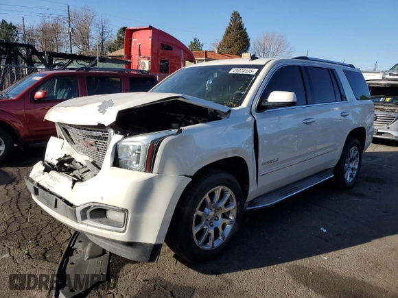2015 GMC Yukon Denali with VIN 1GKS2CKJ7FR183710, listed as a Copart auction lot 49074135 with 230,526 mi miles and Salvage Title. Bid and sale history available at carsss.com. Image 1.
