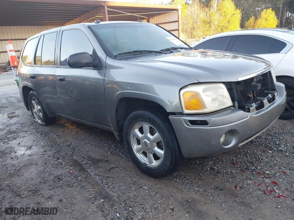 2005 GMC Envoy SLE with VIN 1GKDS13S352215032, listed as a IAAI auction lot 41221612 with 260,647 mi miles. Bid and sale history available at carsss.com. Image 1.