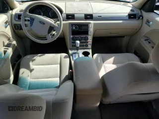2005 Ford Five Hundred SE z VIN 1FAFP23185G157074, wystawiony jako Copart lot #54209285 z przebiegiem 195 519 mil mil oraz Szkody całkowita. Historia ofert i sprzedaży dostępna na DreamBid. Obrazek 8.