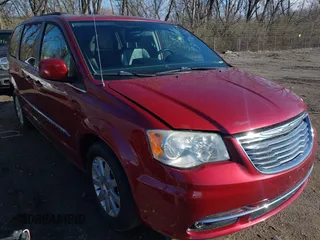 2011 Chrysler Town & Country Touring-L with VIN 2A4RR8DG8BR665797, listed as a IAAI auction lot 41870672 with 142,308 mi miles. Bid and sale history available at carsss.com. Image 1.