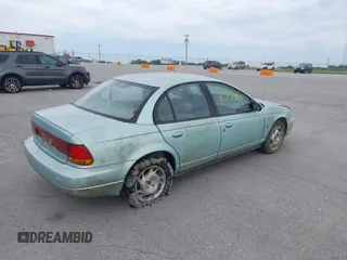 1996 Saturn SL with VIN 1G8ZK5277TZ340863, listed as a IAAI auction lot 42513568 with 130,286 mi miles and . Bid and sale history available at DreamBid. Image 4.