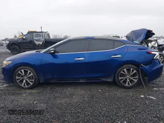 2016 Nissan Maxima SL with VIN 1N4AA6APXGC396890, listed as a IAAI auction lot 41594044 with 144,164 mi miles and . Bid and sale history available at DreamBid. Image 14.