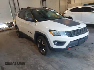 2017 Jeep Compass Trailhawk with VIN 3C4NJDDB0HT611263, listed as a IAAI auction lot 42547466 with 136,225 mi miles and . Bid and sale history available at DreamBid. Image 1.