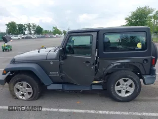 2016 Jeep Wrangler Willys Wheeler with VIN 1C4GJWAG2GL318981, listed as a IAAI auction lot 42390588 with 131,559 mi miles and . Bid and sale history available at DreamBid. Image 14.