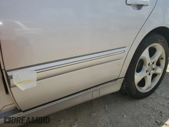 2002 Mercedes-Benz E-Class with VIN WDBJF65J02B495961, listed as a Copart auction lot 73844554 with 99,380 mi miles and Salvage Title. Bid and sale history available at carsss.com. Image 12.
