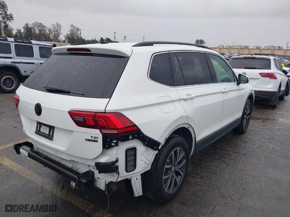 2018 Volkswagen Tiguan SEL with VIN 3VV2B7AX4JM140172, listed as a IAAI auction lot 41731061 with 103,459 mi miles. Bid and sale history available at carsss.com. Image 4.