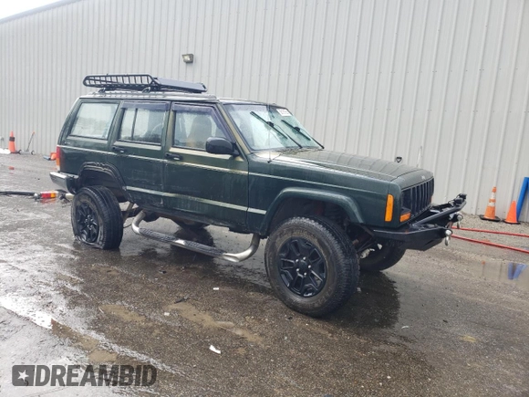 1997 Jeep Cherokee SE с VIN 1J4FJ28S5VL509588, выставлен на аукционе Copart как лот 56181695 с пробегом 313 430 миль миль и Списание • Salvage title. История ставок и продаж доступна на DreamBid. Изображение 4.