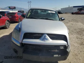 2006 Mitsubishi Raider LS z VIN 1Z7HC22K06S581912, wystawiony jako Copart lot #70500254 z przebiegiem 137 038 mil mil oraz Szkoda całkowita • Salvage title. Historia ofert i sprzedaży dostępna na DreamBid. Obrazek 5.